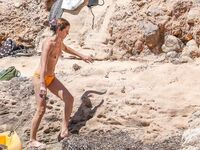 Emma Watson Caught By Paparazzi Sunbathing Topless
