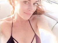 Lindsay Lohan Shows Her Big Tits On A Beach