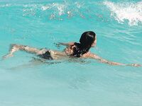 Courteney Cox Nip Slip And Tight Bikini Photos
