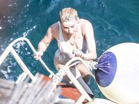 Amber Heard Wet Swimsuit And Bare Tits Photos