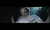 Rectal pioneer Paul Bettany naked inside a medieval shower contraption