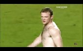 Rooney takes of his shirt revealing his bear cub hairy chest